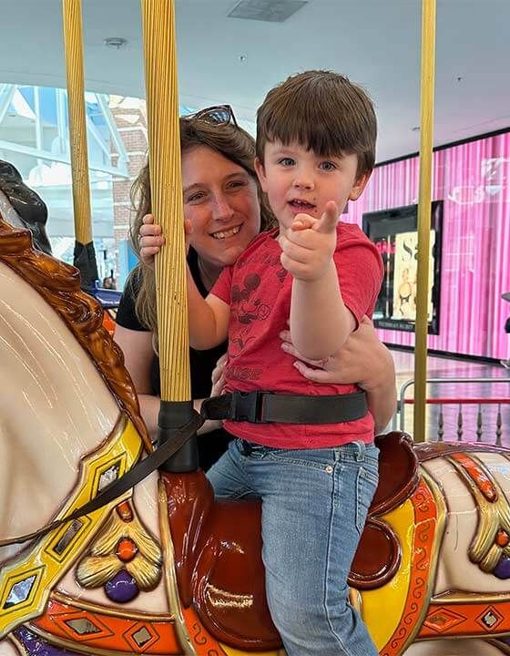 Lisa and Elliot on a Carousel in Florida.